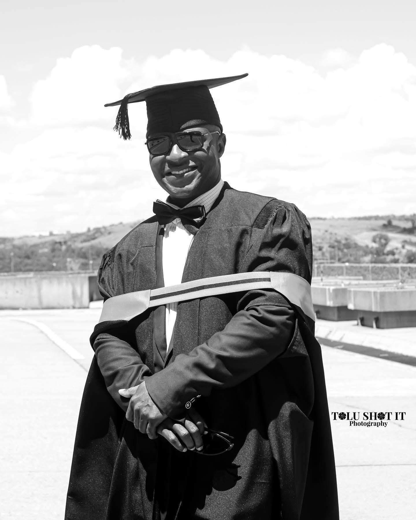 Graduate with family celebrating